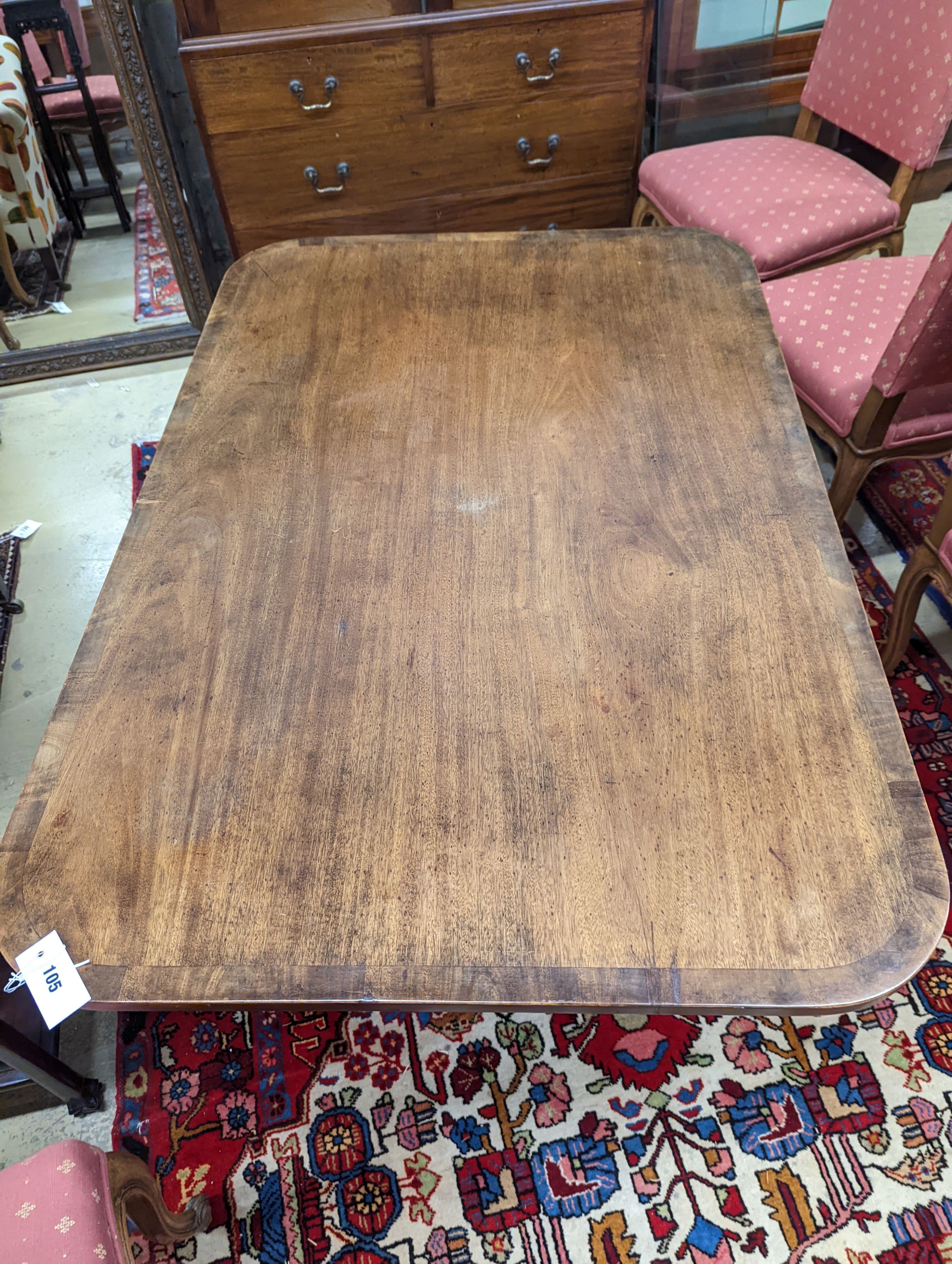 A Regency banded mahogany rectangular tilt top dining table, length 121cm, depth 82cm, height 71cm
